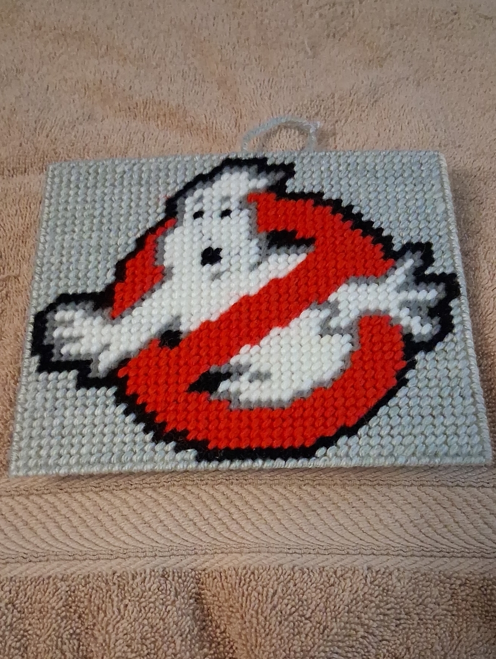 Handmade Ghostbuster-Inspired Wall Art – White and Red